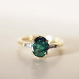 Oval Emerald engagement ring set in gold, by Macha Studio, Brooklyn NYC