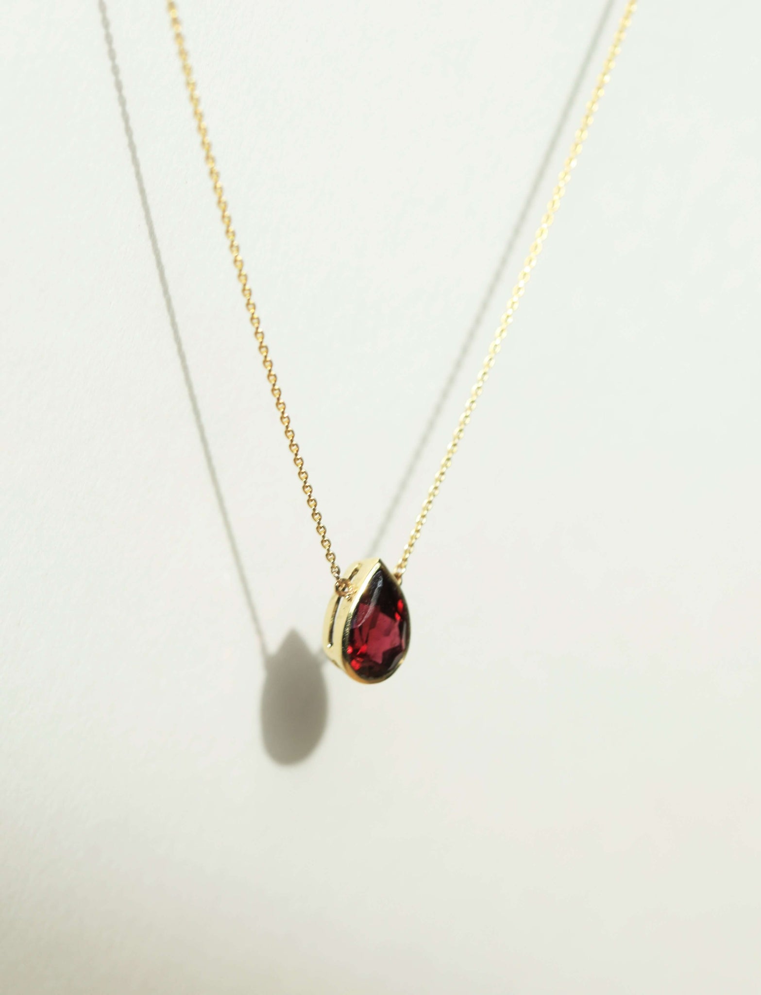 Garnet pear 14k gold necklace Brooklyn New York 11222