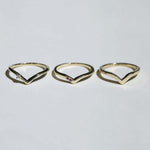 assorted v shaped bands 14k yellow gold diamonds rubies handcrafted macha studio brooklyn new york