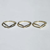 assorted v shaped bands 14k yellow gold diamonds rubies handcrafted macha studio brooklyn new york