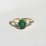 Oval Emerald engagement ring set in gold, by Macha Studio, Brooklyn NYC