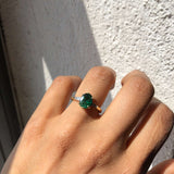Oval Emerald engagement ring set in gold, by Macha Studio, Brooklyn NYC