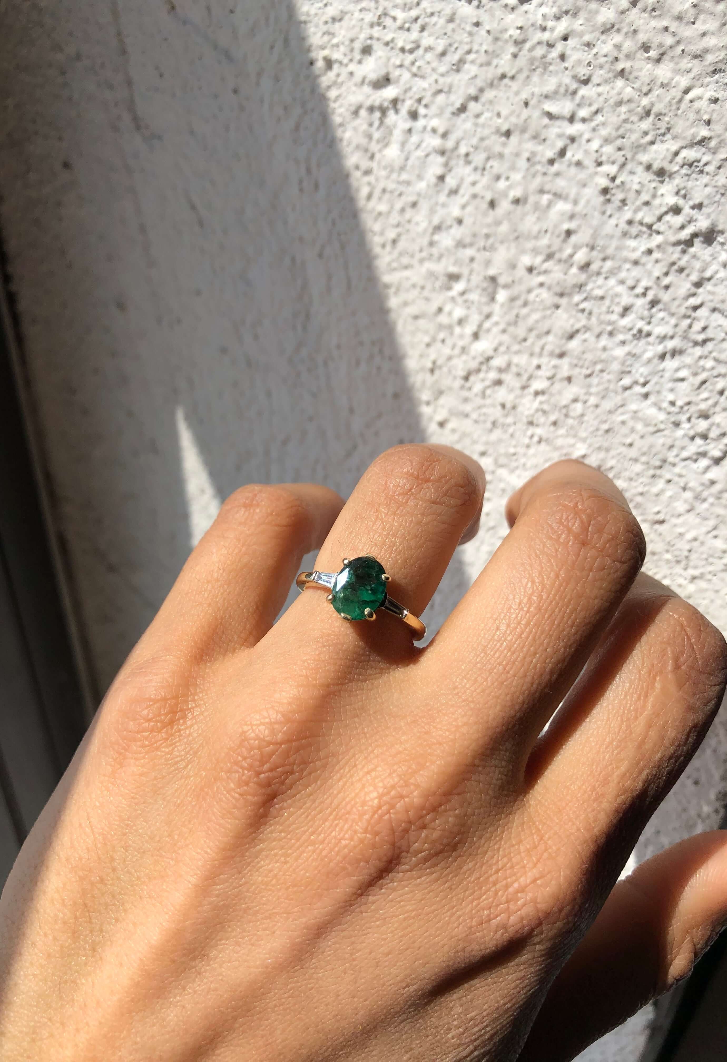 Oval Emerald engagement ring set in gold, by Macha Studio, Brooklyn NYC