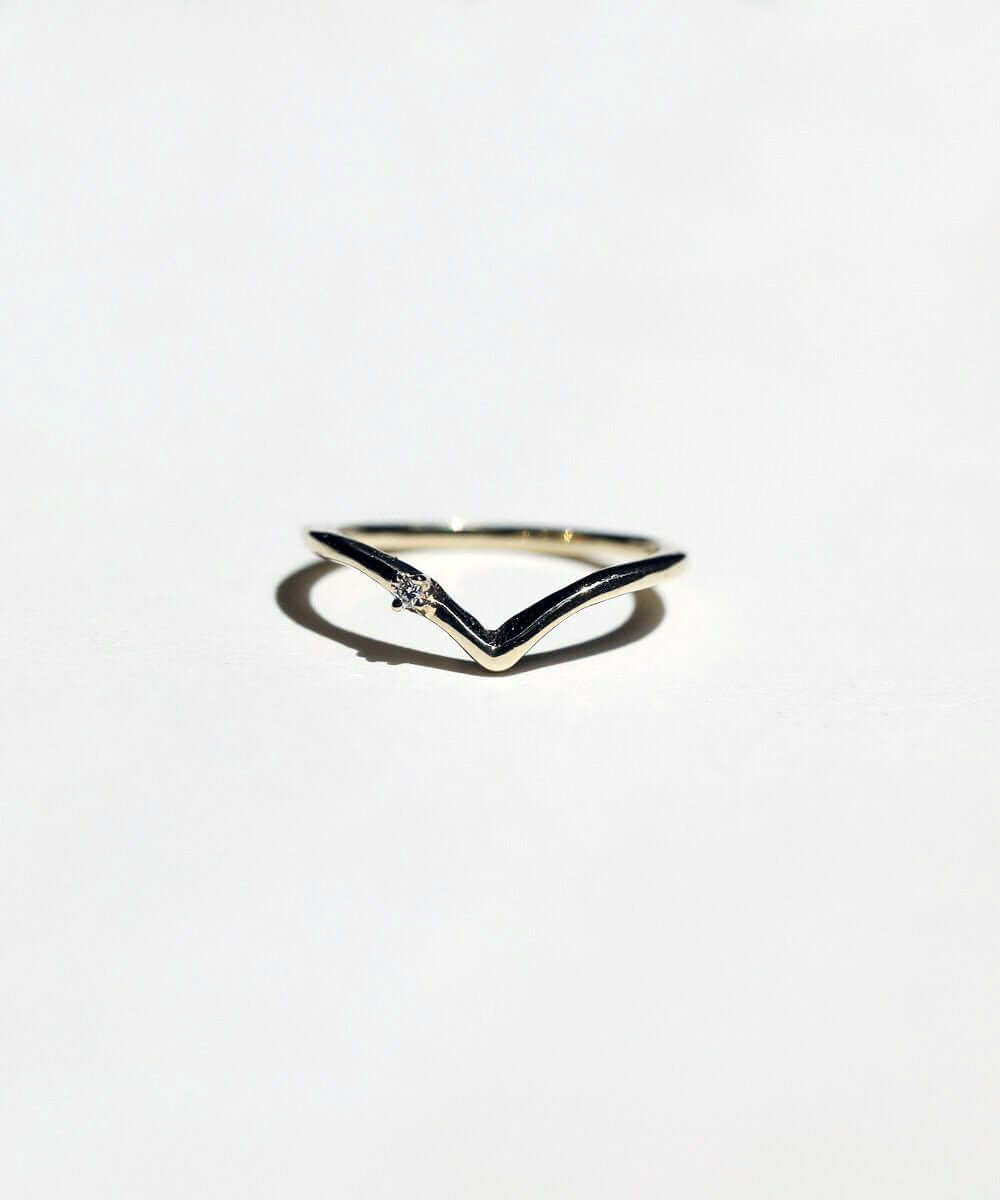V shaped 14k yellow gold band with tiny white diamond macha studio brooklyn new york