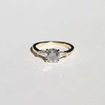 semi-translucent salt n pepper diamond engagement ring accented by white tapered baguettes set in 14k gold band macha studio brooklyn new york