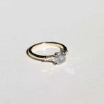 semi-translucent salt n pepper diamond engagement ring accented by white tapered baguettes set in 14k gold band macha studio brooklyn new york