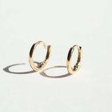 mini hinged huggies gold earrings Brooklyn New York 
