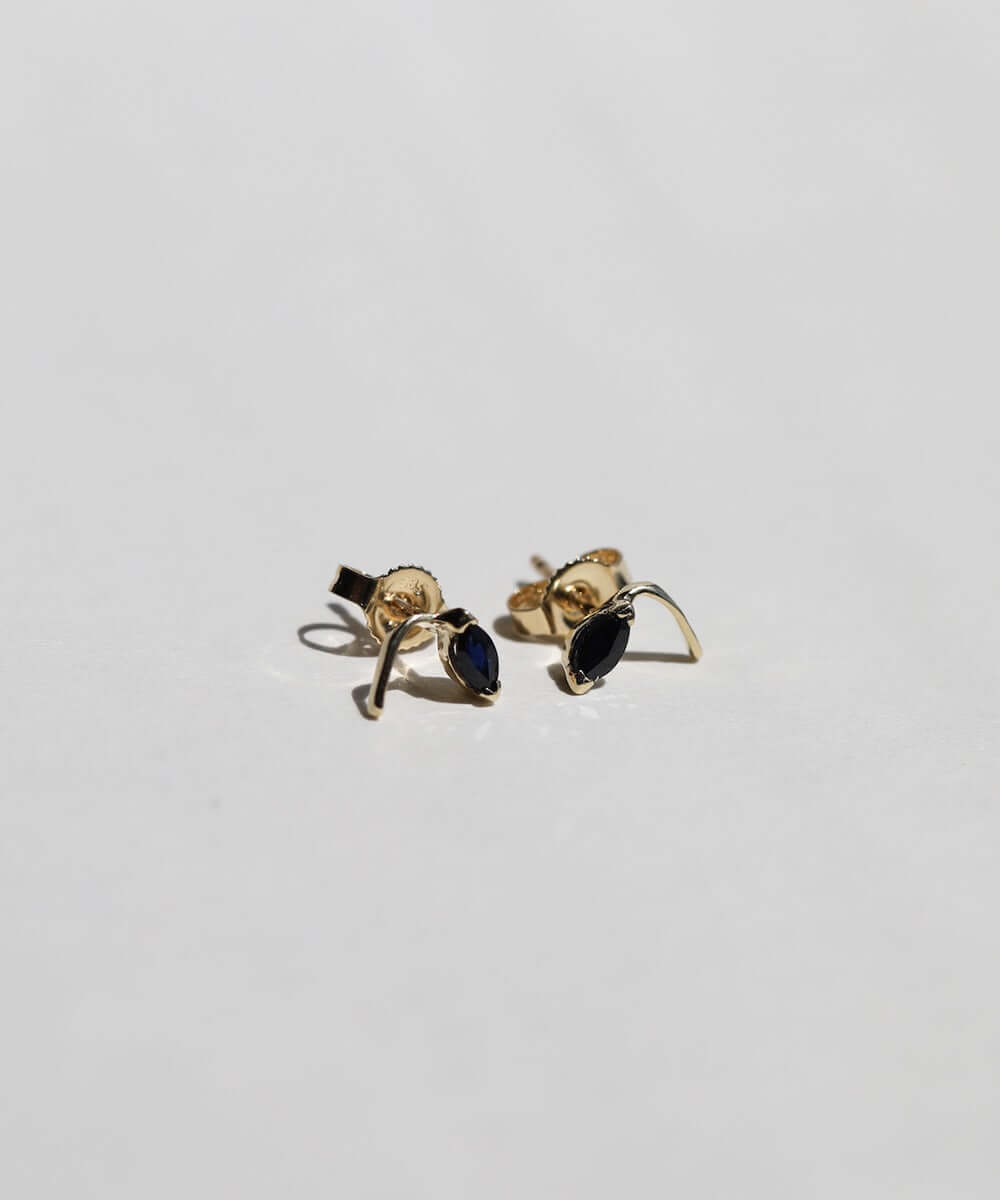 round cut blue sapphires set in 14k gold stud earrings handcrafted macha studio brooklyn new york