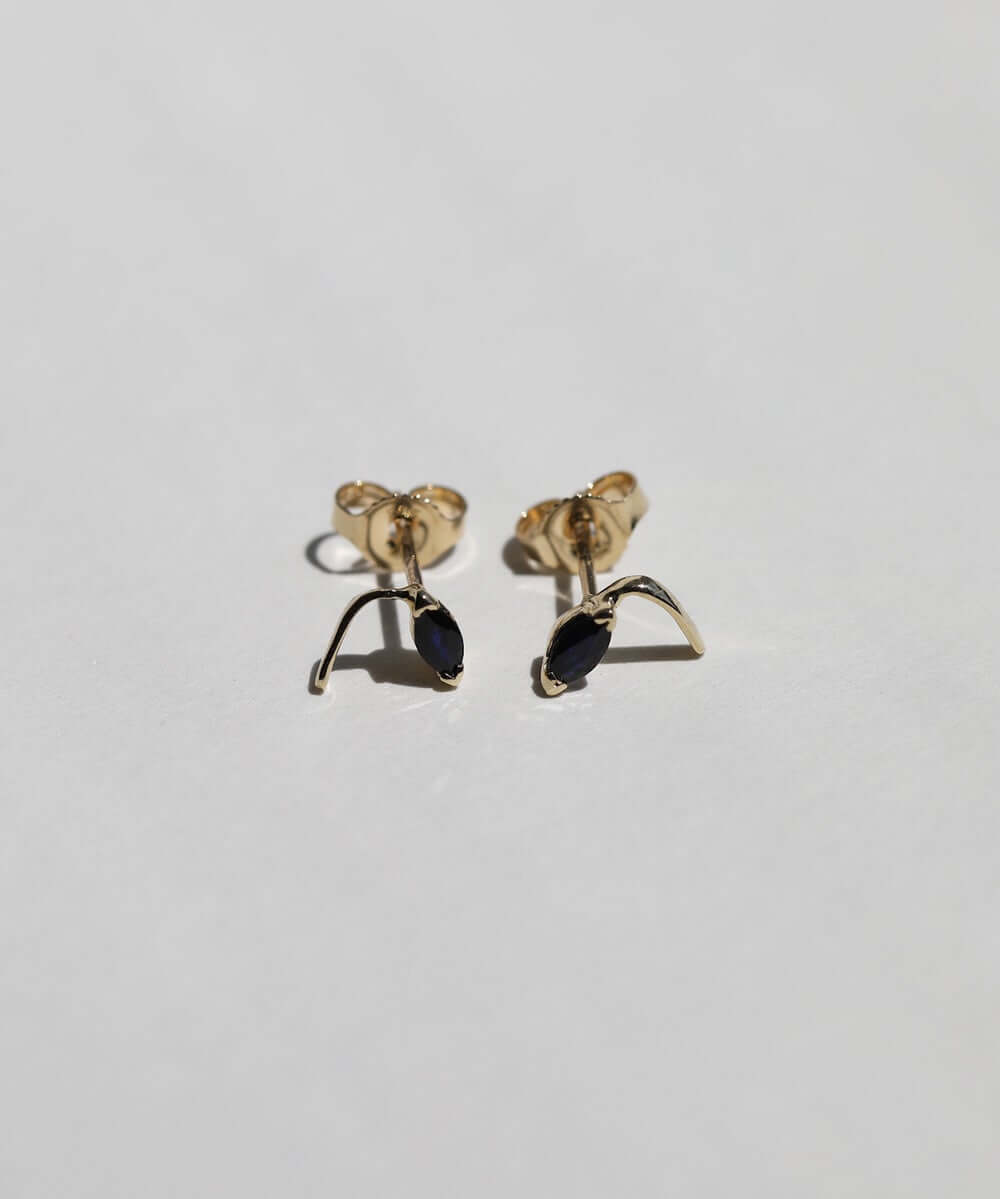 round cut blue sapphires set in 14k gold stud earrings handcrafted macha studio brooklyn new york