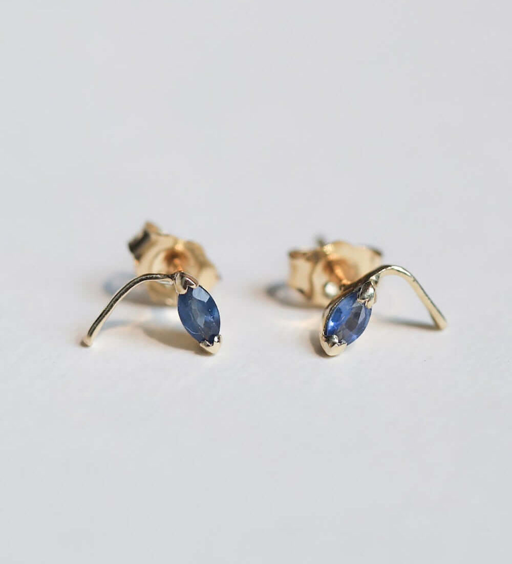 round cut blue sapphires set in 14k gold stud earrings handcrafted macha studio brooklyn new york
