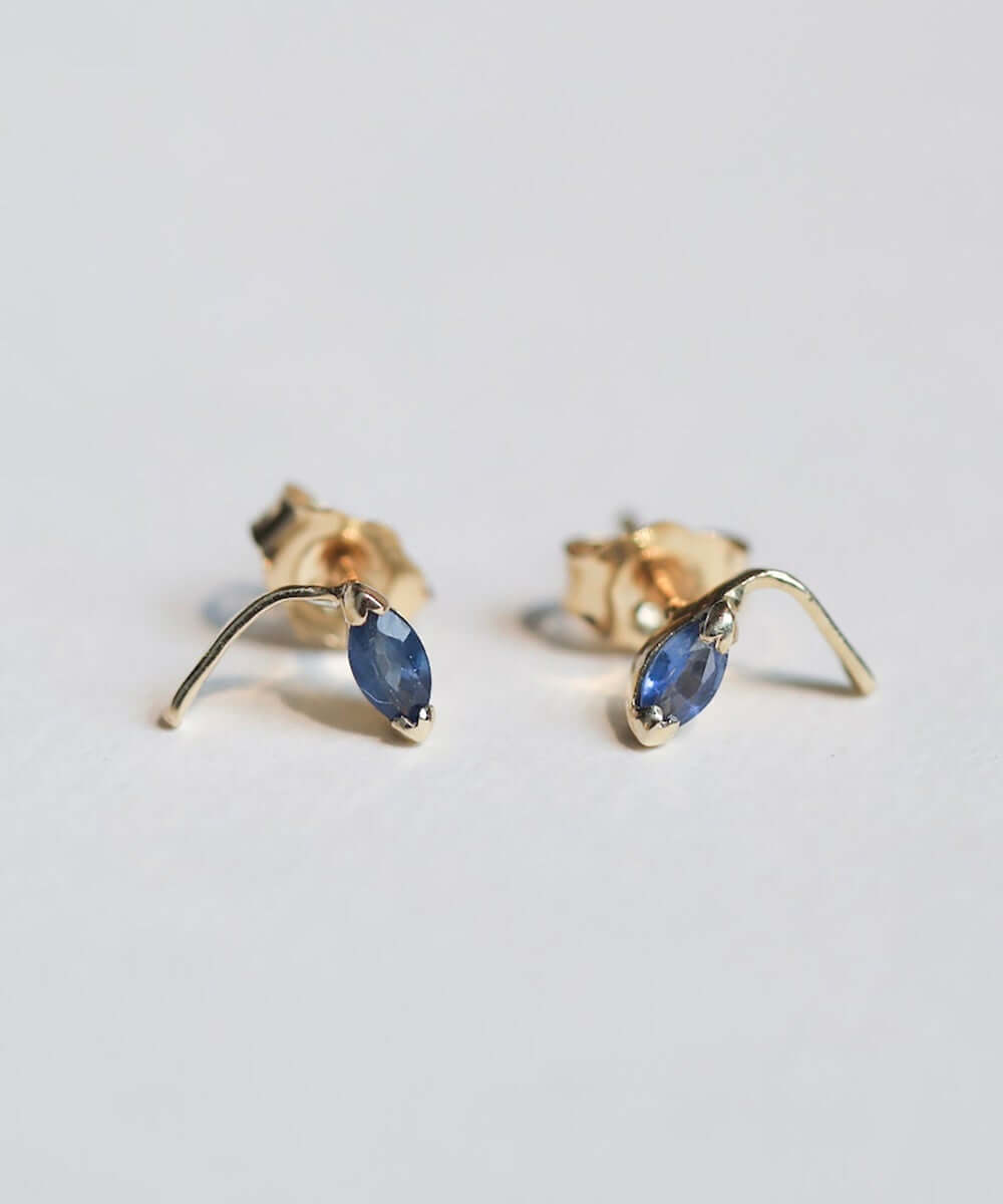 round cut blue sapphires set in 14k gold stud earrings handcrafted macha studio brooklyn new york