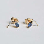 round cut blue sapphires set in 14k gold stud earrings handcrafted macha studio brooklyn new york