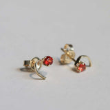 round cut orange sapphires set in 14k yellow gold earrings handcrafted macha studio brooklyn new york