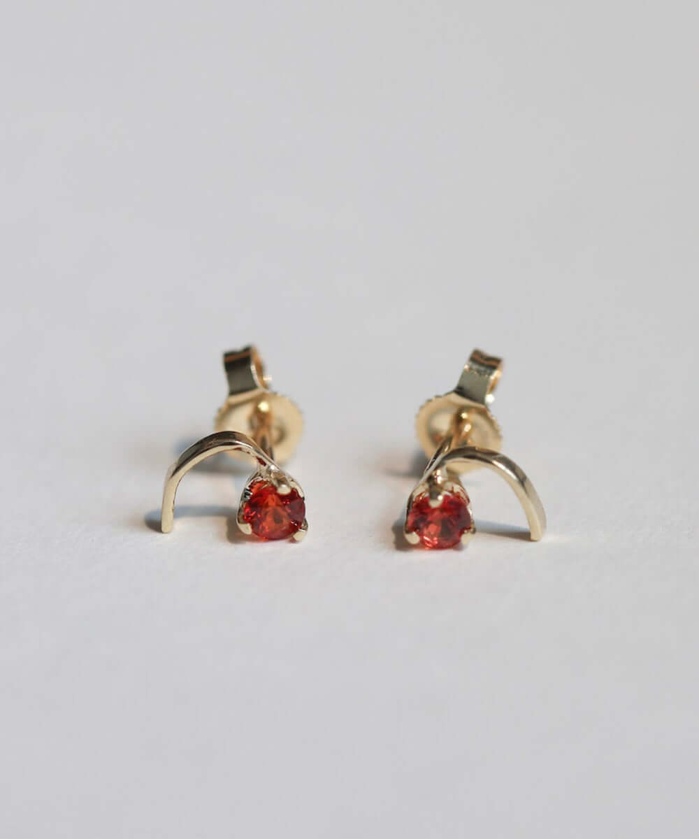 round cut orange sapphires set in 14k yellow gold earrings handcrafted macha studio brooklyn new york