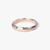 Rose gold ragged wedding band by Macha Brooklyn, NYC