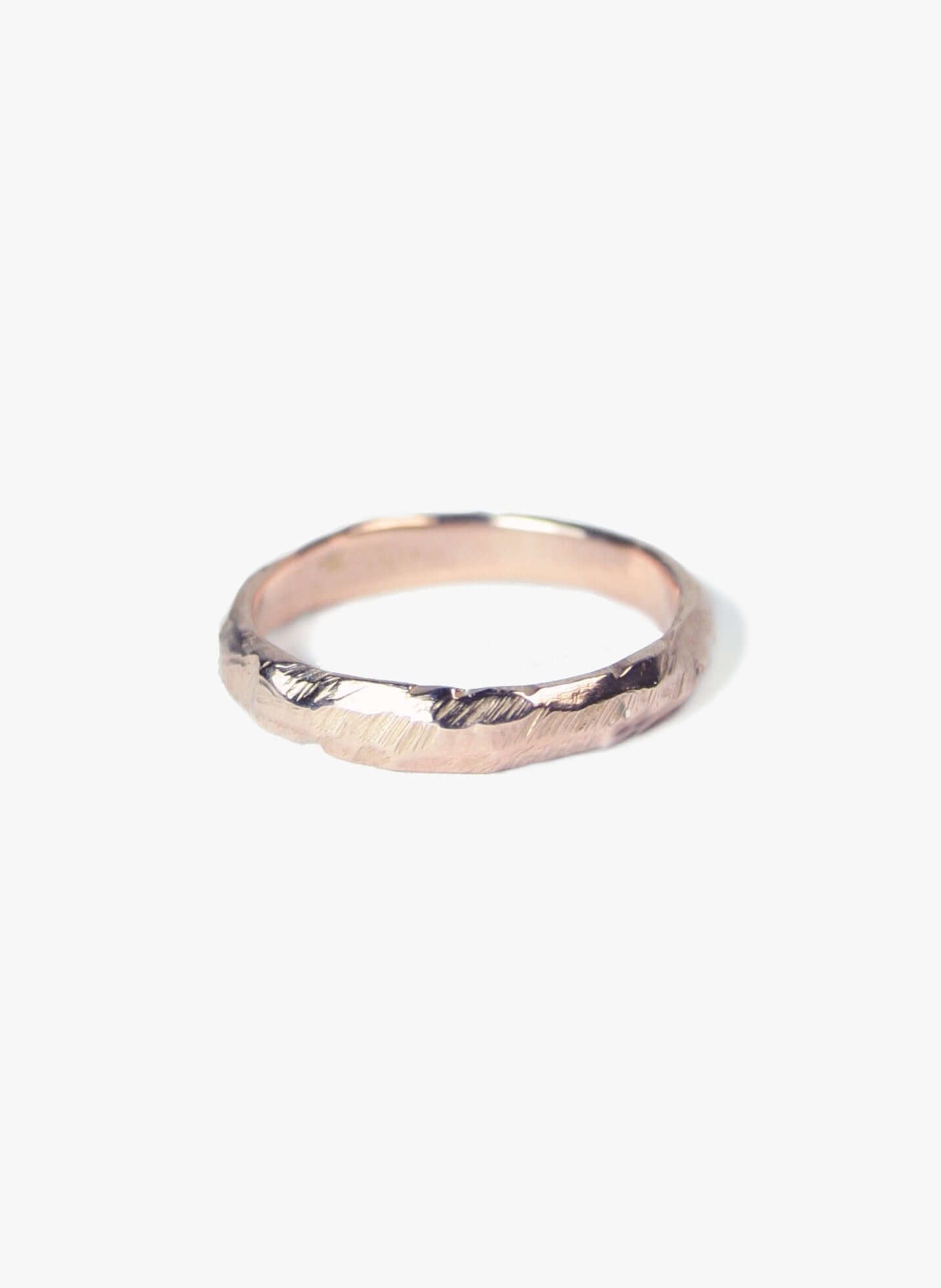 Rose gold ragged wedding band by Macha Brooklyn, NYC