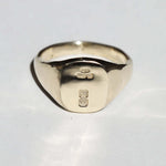 small 14k yellow gold signet ring with rounded square face featuring British hallmarks and date letter 'w' handcrafted macha studio brooklyn new york