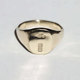 small 14k yellow gold signet ring with rounded square face featuring British hallmarks and date letter 'w' handcrafted macha studio brooklyn new york