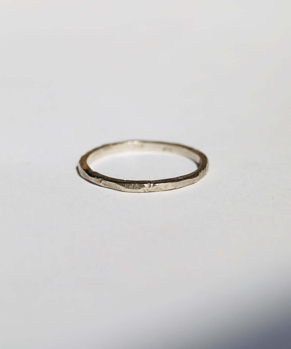 1.5mm ragged texture gold wedding band macha studio brooklyn new york