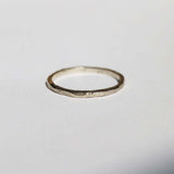 1.5mm ragged texture gold wedding band macha studio brooklyn new york