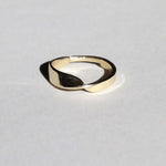 wide 14k gold band with twisted feature and narrow back macha studio brooklyn new york