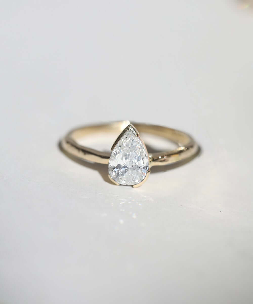 Pear Diamond Solitaire with Adrift Setting