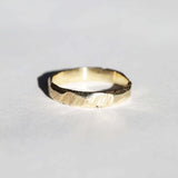 handmade 14k yellow gold band with ragged texture macha studio brooklyn new york