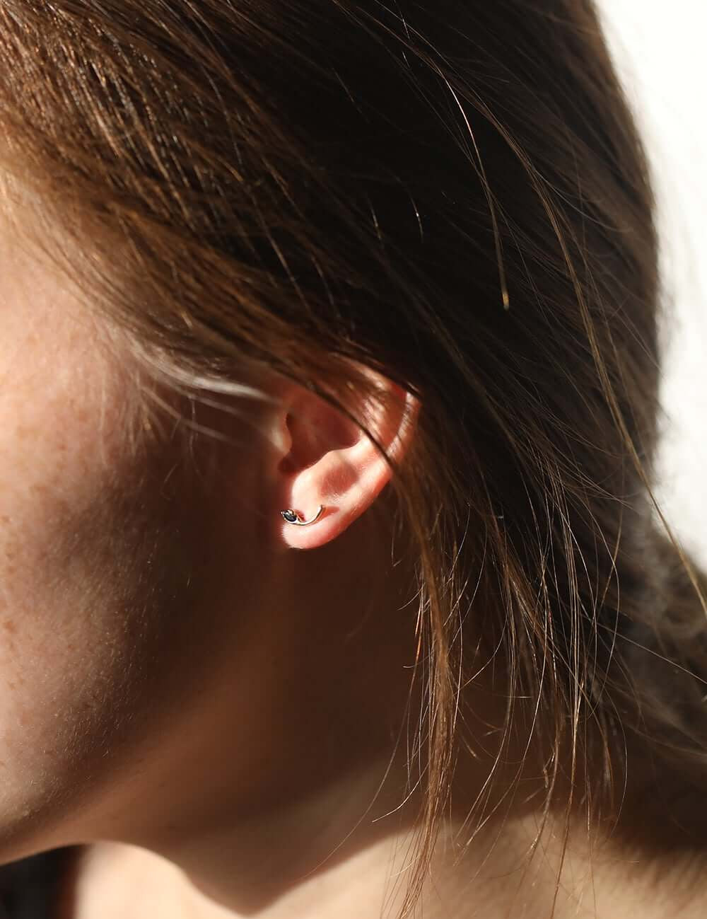 round cut blue sapphires set in 14k gold stud earrings handcrafted macha studio brooklyn new york